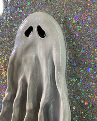 Holographic Ghost